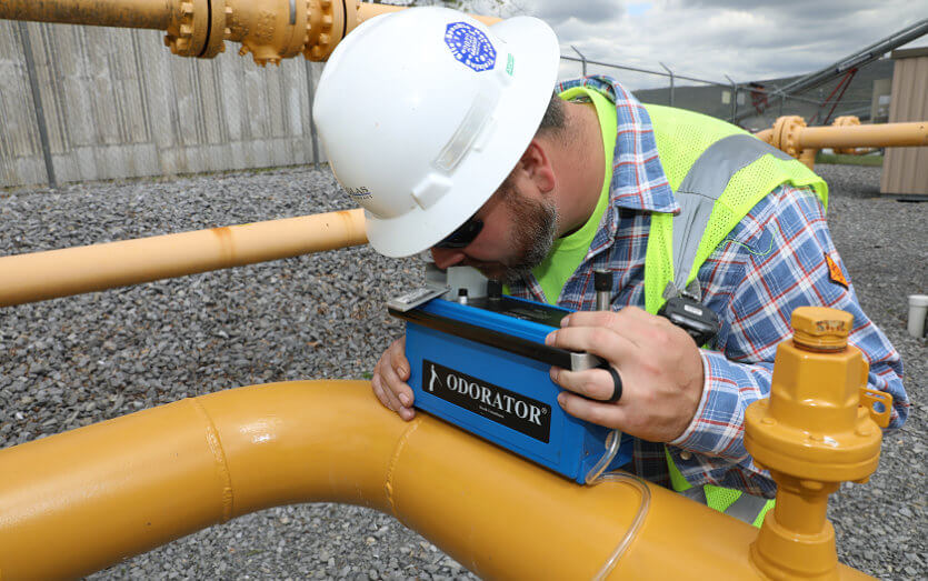 Douglas Pipeline employee checking pipeline for safety & environmental protection